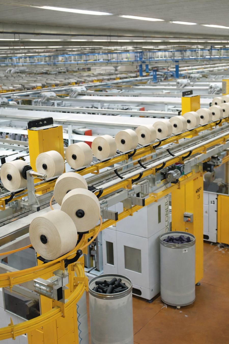 Automated cone package handling and palletizing cell