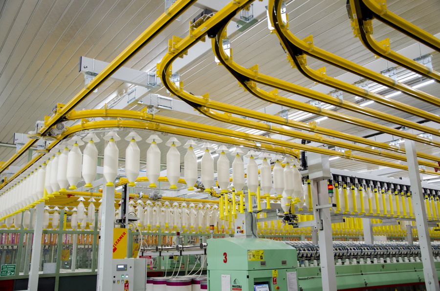 Roving bobbin transport line with automated buffers
